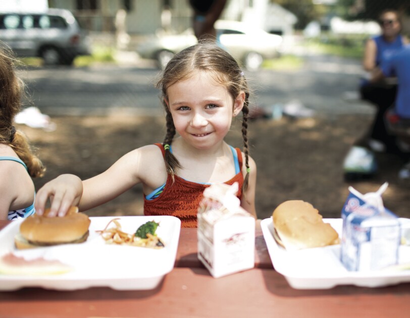 No Kid Hungry - kids in a school setting eating