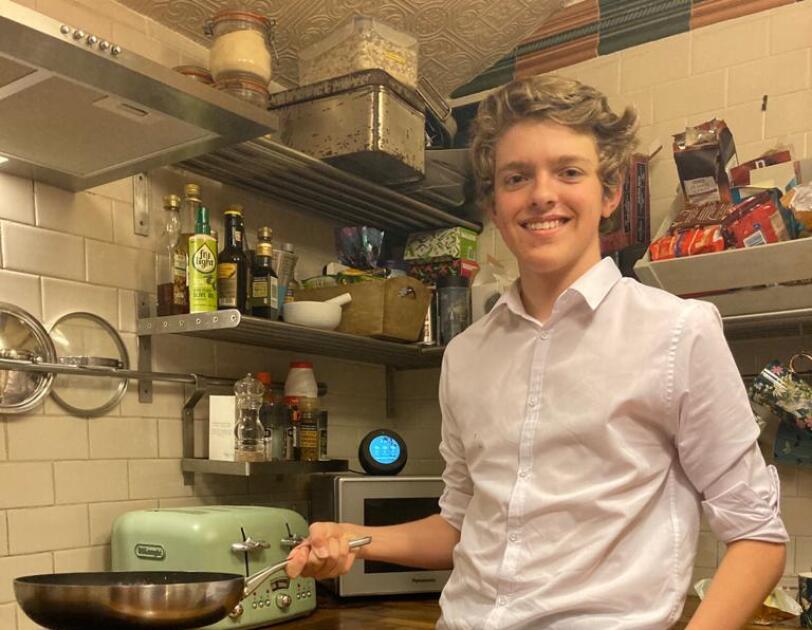 Harrison with a cooking pan