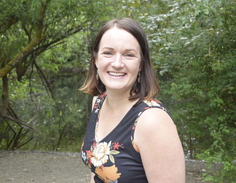 A photo of JoAnna Hunt, Principal Project Manager leading the Kindle Accessibility Team and Director of A11yCon.