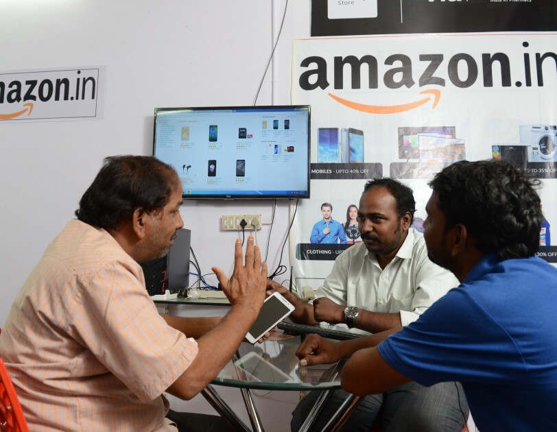An Udaan point with a customer
