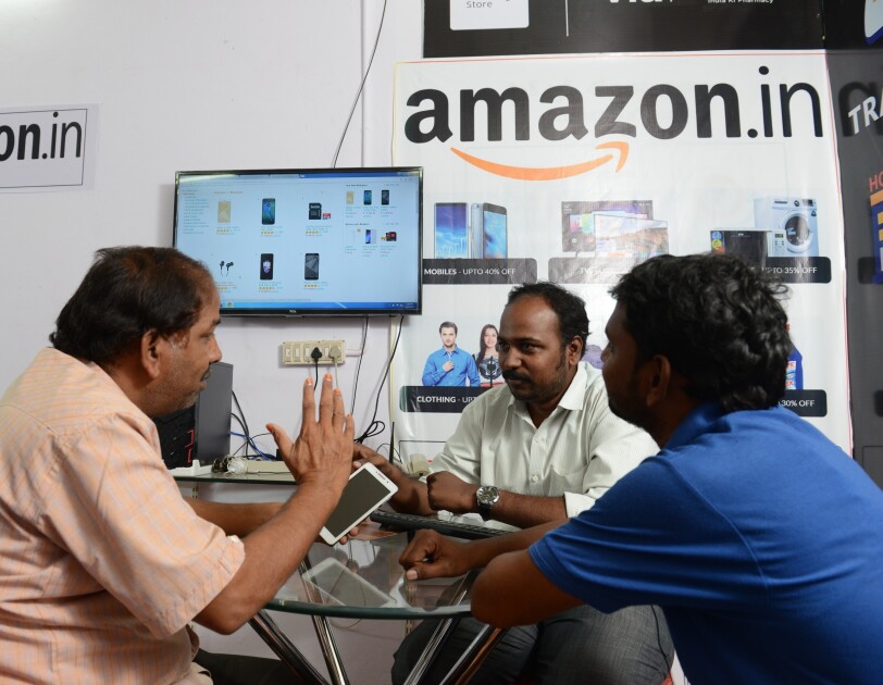 An Udaan point with a customer