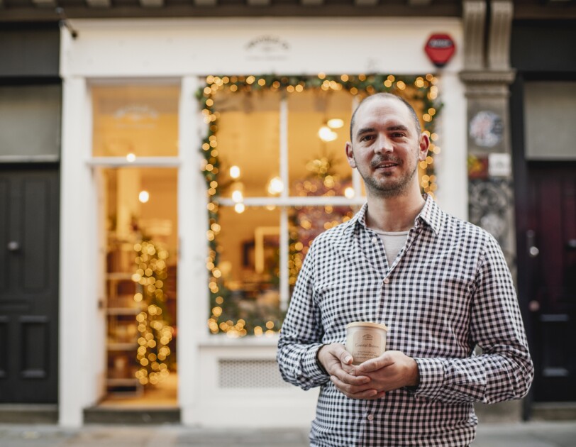 Tim Rundle-Wood, founder of Twoodle Co, in front of his shop in London