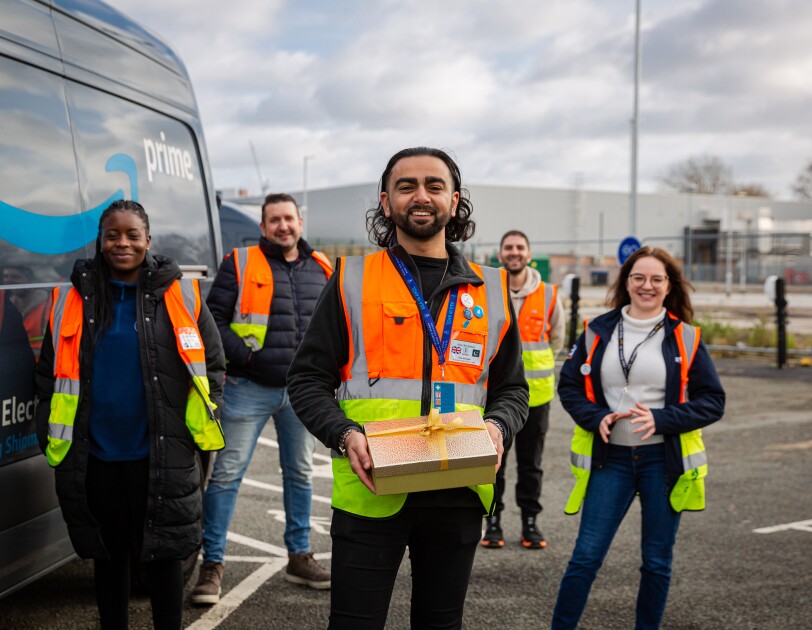 Aizaz with his colleagues at Amazon's Croydon Delivery Station