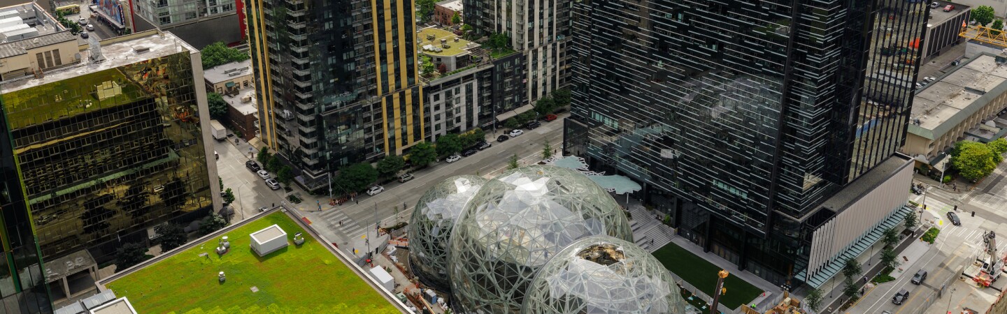A photo of Amazon's Day One building and the construction of the Seattle Spheres.