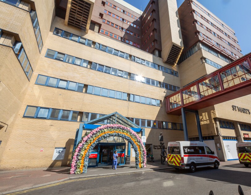 Front of St Mary's hospital with flowers around the door