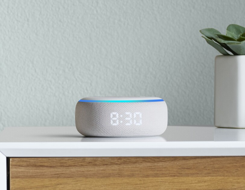 New Amazon Echo with clock on a bedside table