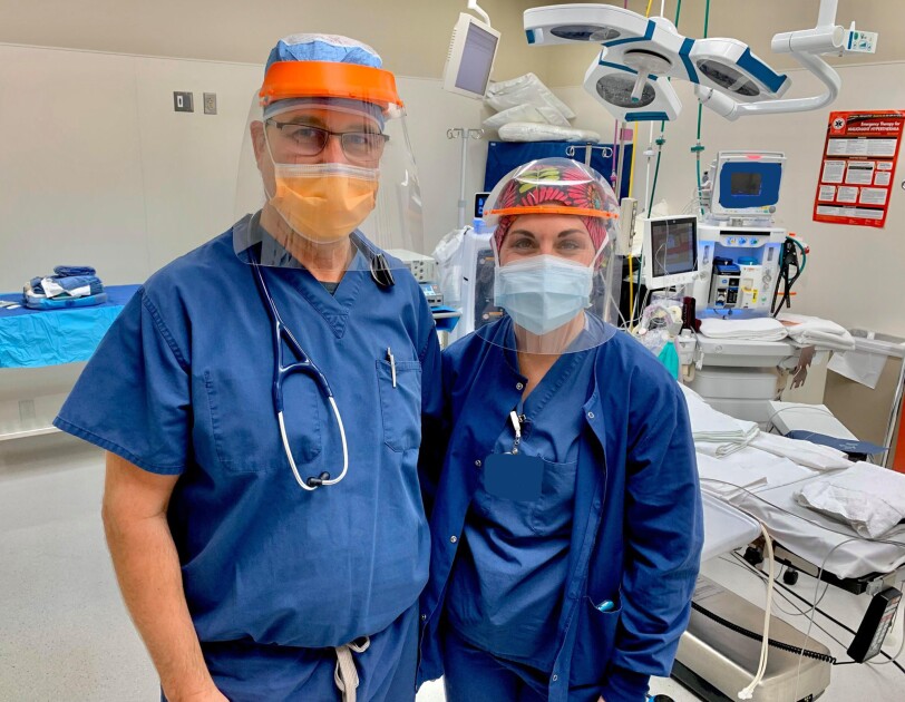 Volunteers work together to use technology to make PPE for medical professionals during the COVID-19 pandemic
