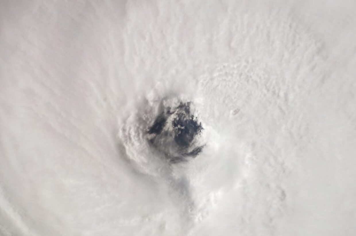 A satellite image of the eye of a hurricane illustrates how ASDI enables critical climate research.