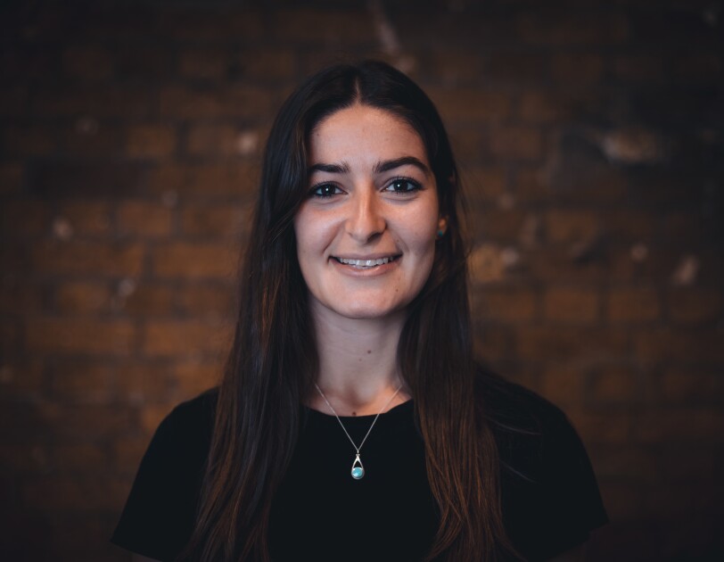 A headshot of Sasha Haco, Founder of Unitary