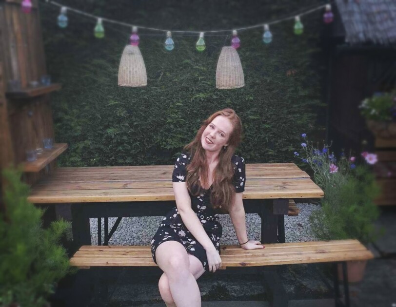 Kirsty Balfour sitting on a bench