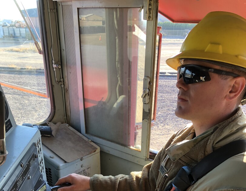 A man wearing a National Guard uniform in a military setting