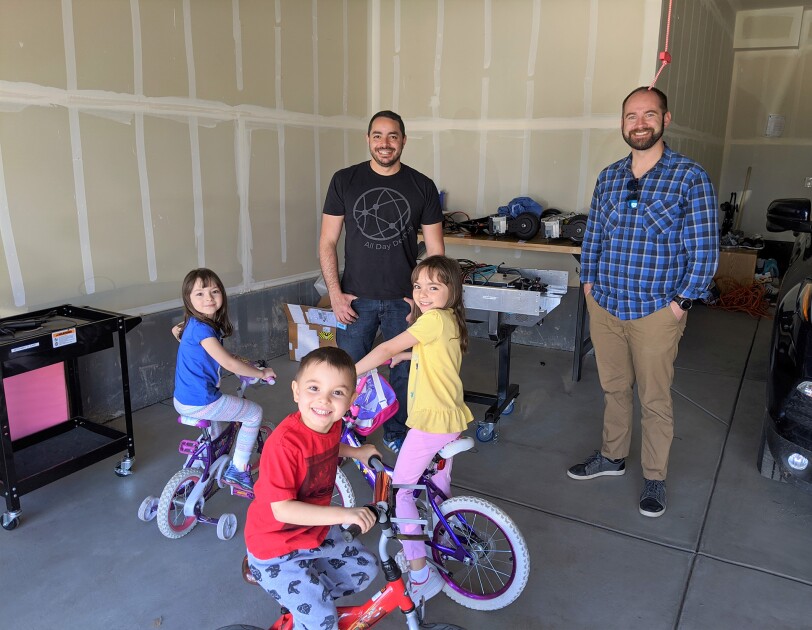 Amazon employee working on robotics advancement from his garage during the pandemic