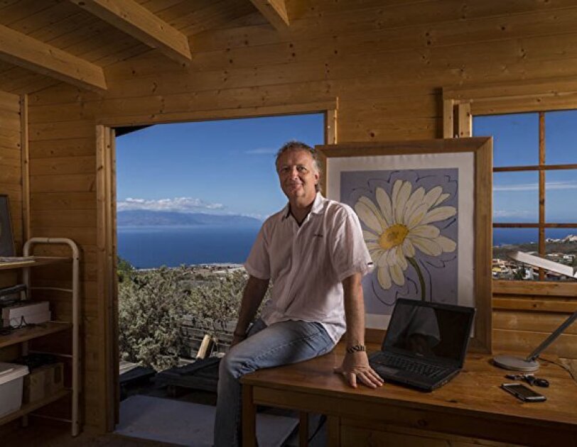 Tenerife-based author Joe Cawley at his desk overlooking the Canary Islands coast