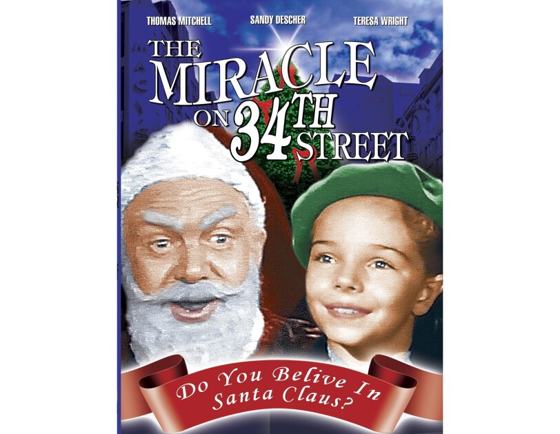 Cover art for "The Miracle on 34th Street" shows a man dressed like santa, next to a young child in a green beret, with a Christmas tree behind them.