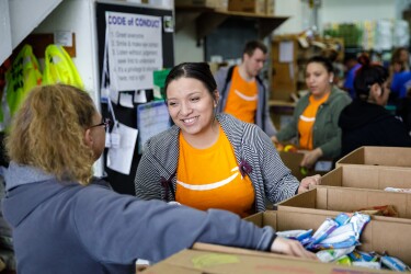 Amazon employees volunteer at a community food bank in the Puget Sound region of Washington state.