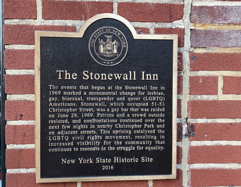 A plaque on The Stonewall Inn that tells of the historical relevance of the site.
