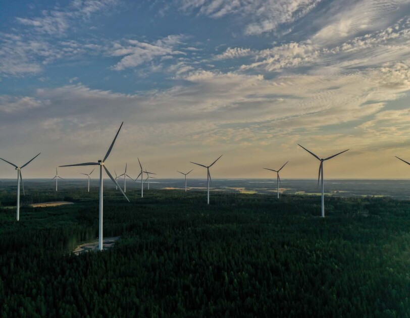 Photo looking into the horizon of wind turbines in Bäckhammar, Sweden