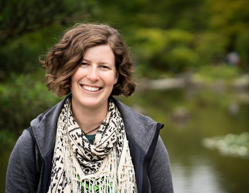 Kate Koehn head shot against green background