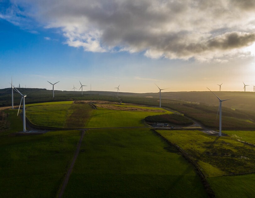 A wind energy farm in fields in Europe.