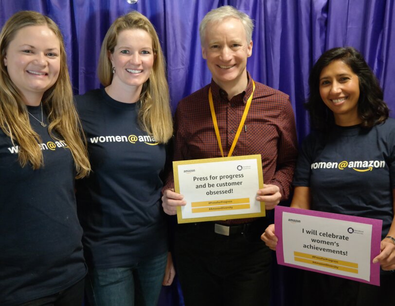 Amazon Women in Innovation Bursary program posing with Doug Gurr, UK Country Manager