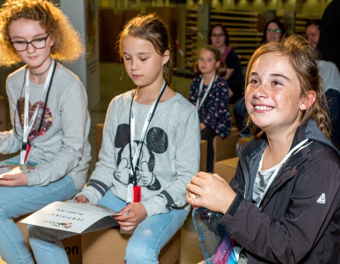 Students at community event