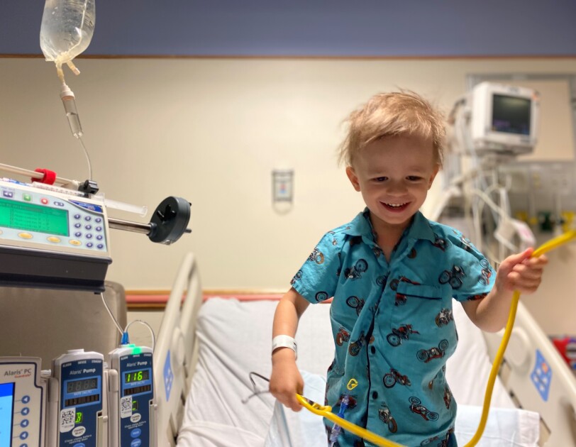 Picture of little Wes, a smiling blond boy wearing a pajama and holding a stethoscope.