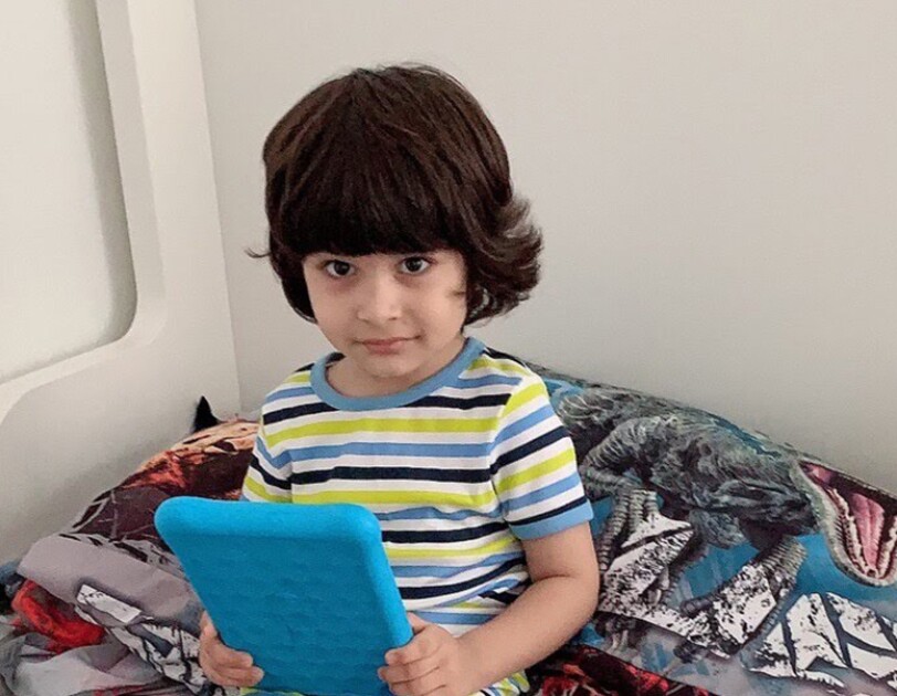 A person received a Kindle device from Amazon.