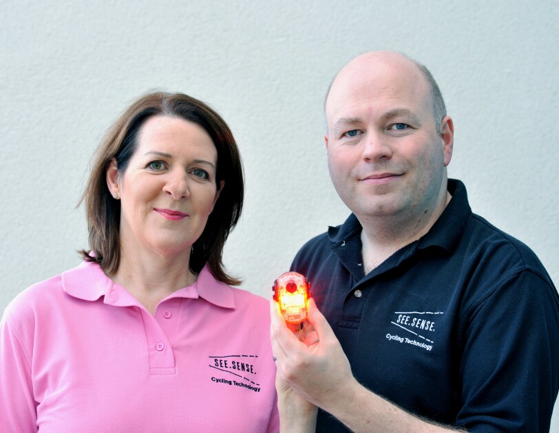 See.Sense founders Irene and Philip holding a bike light