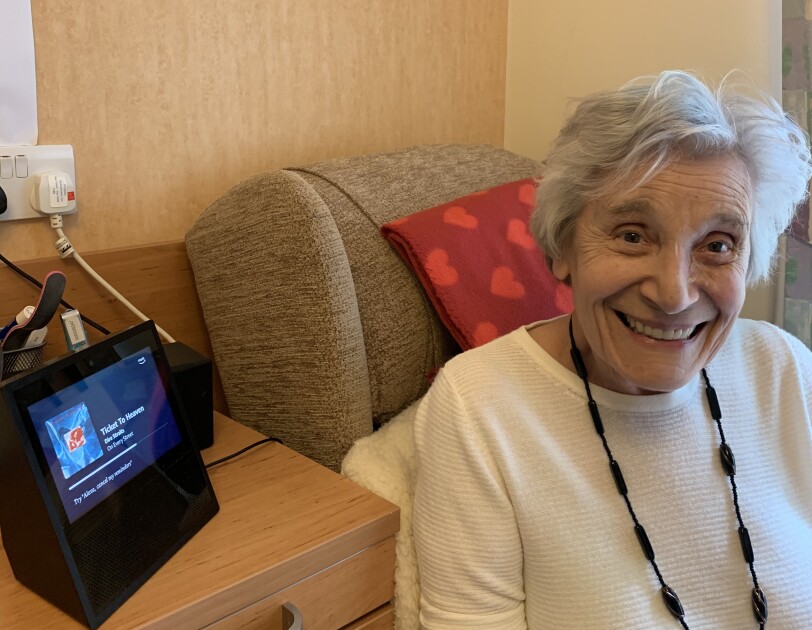 Ruth, one of the residents of Hampton Care home, near her Echo Show device